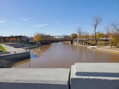 The St. Marys River and Promenade Park in downtown Fort Wayne on a clear day