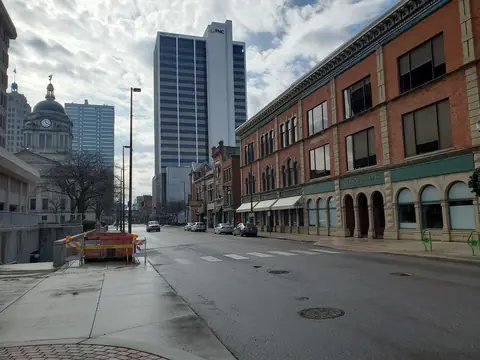 A downtown Fort Wayne street lined with brick buildings