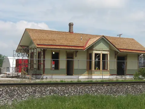 The old Wabash Railroad depot beside the tracks in New Haven, Indiana