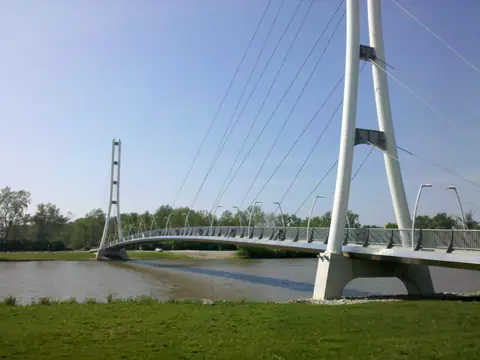 A cable-stayed trail bridge over the St. Joseph River on the north side of Fort Wayne