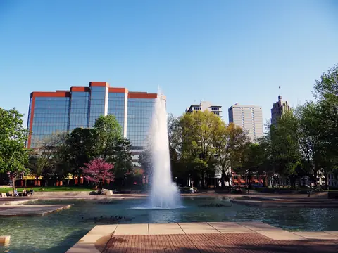 The fountain in Freimann Square with downtown Fort Wayne office towers behind it
